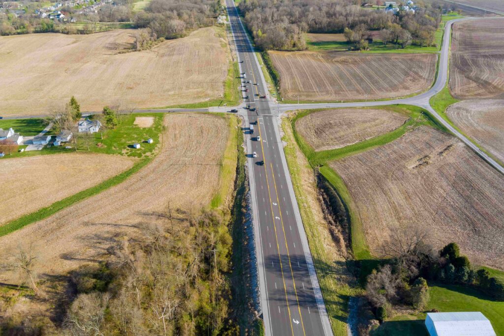 Aerial view of a rural Midwest highway intersection surrounded by farmland